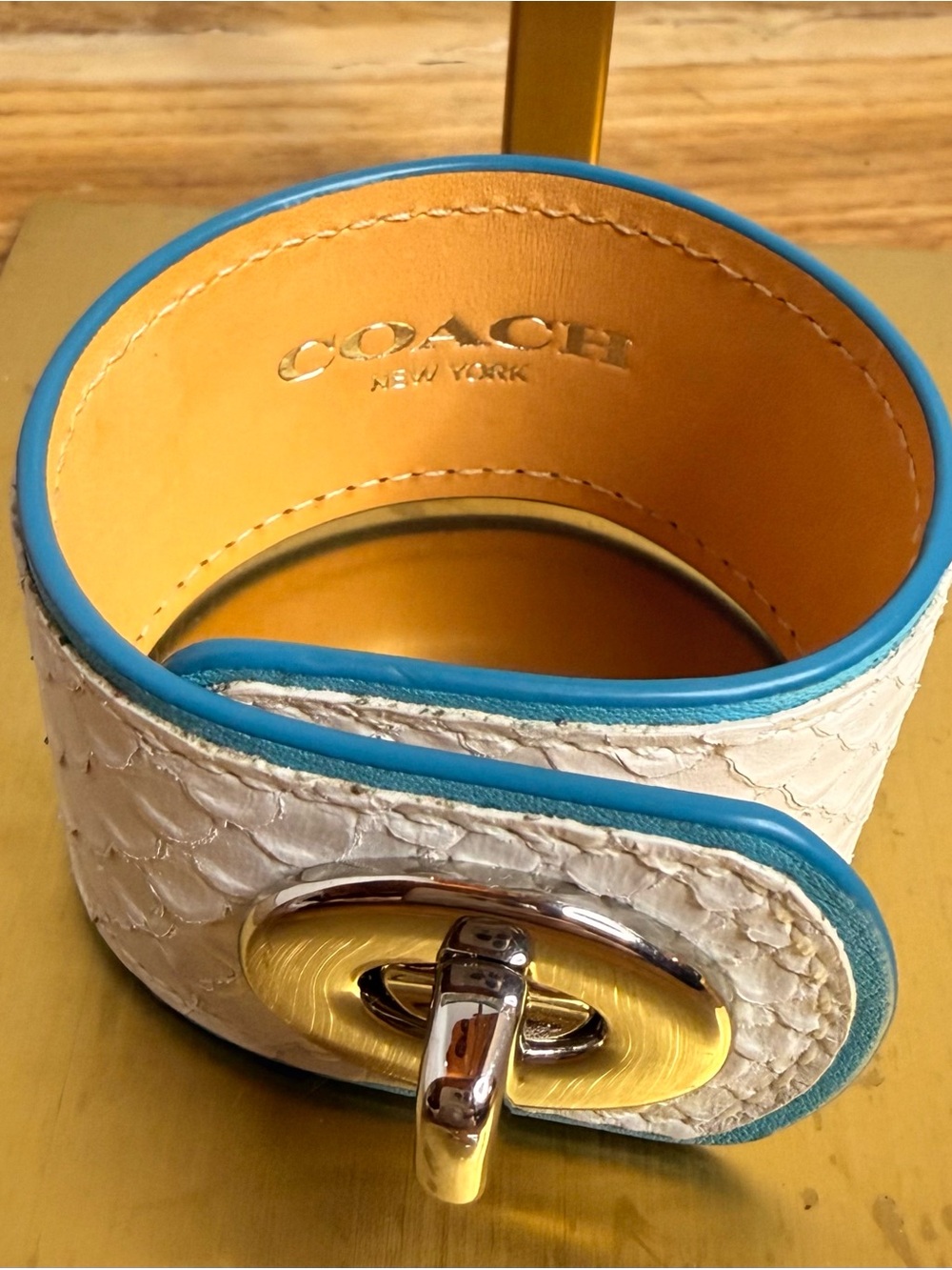 Coach, White Python Embossed Leather Turnlock Cuff Statement Bracelet, Blue Trim